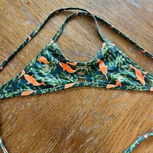 Jolynn,women’s , bikini top, tomcat, size small.